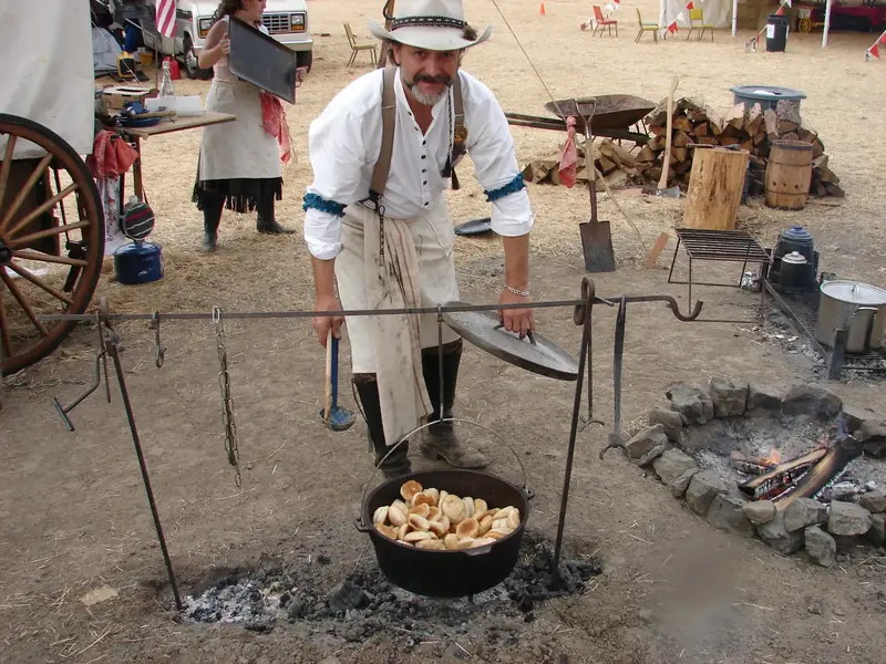 OOWSS member Isaac Scrambler Day cooking breakfast over an open campfire